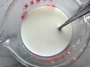 Cornstarch & milk slurry for Shell Pasta with Italian Sausage and Kale. It's loaded with a salty homemade Chicken Italian Sausage flavored with garlic and fennel in a parmesan, garlic and kale sauce.