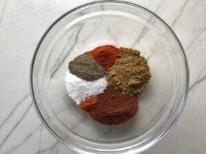 Spices for Chili Mac and Cheese. This Recipe has creamy and cheesy pasta topped with smokey, tangy, savory beef chili! #macandcheese #chilirecipes