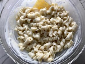 Mixed Mac and Cheese for Chili Mac and Cheese. This Recipe has creamy and cheesy pasta topped with smokey, tangy, savory beef chili! #macandcheese #chilirecipes