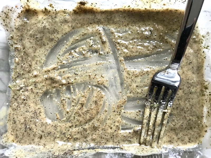 Marinade in bowl for Tarragon Mustard Chicken with Red Peppers. It's creamy, tangy, savory, and so addictive.