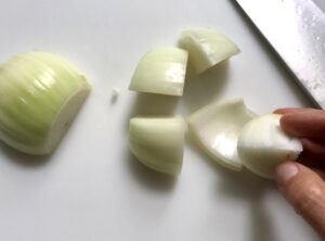 Cut onion for Garlic Steak Kabobs. #beefkabobs #steakkabobs