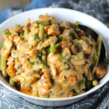 Chorizo Sausage and Green Bean Casserole in a serving bowl are a creamy and savory side dish. One of the best holiday side dishes.