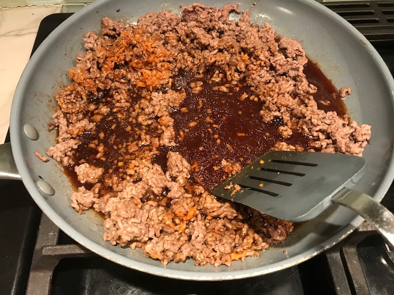 Korean Bulgogi Ground Beef cooked in a skillet for Korean Beef and Rice Bowls.