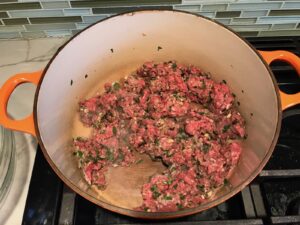 Ground beef and herbs cooking in a pot for White Lasagna Recipe with Zucchini and Ground Beef