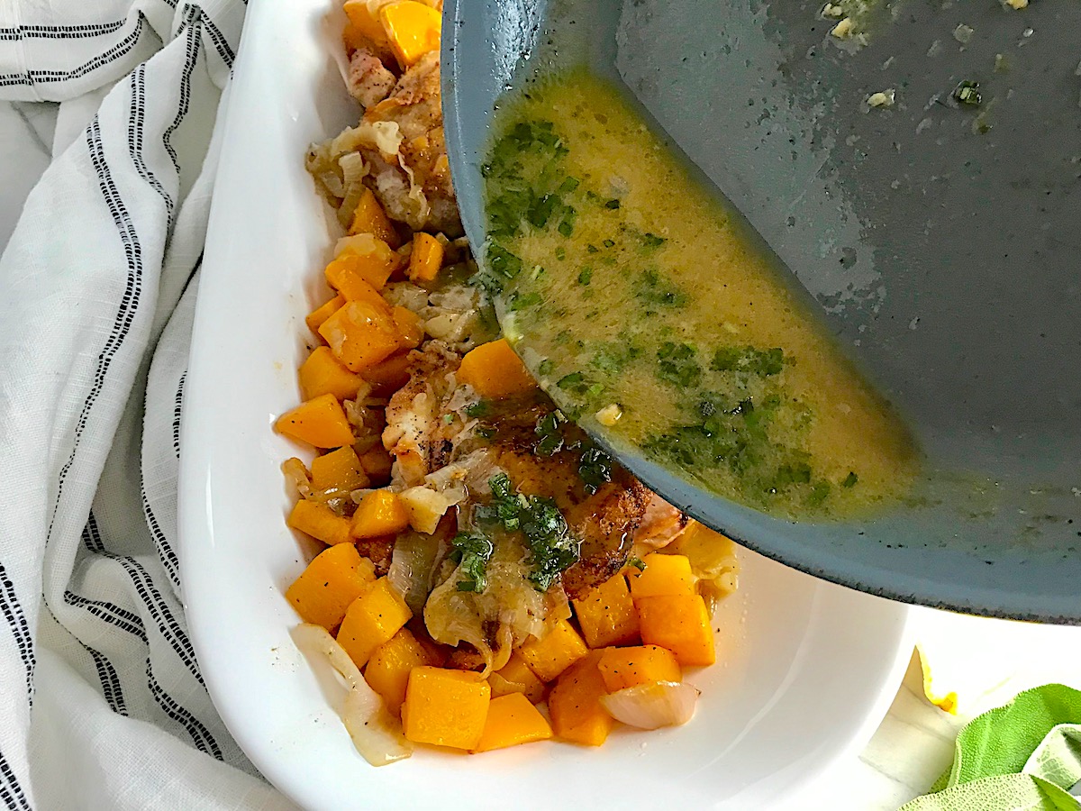 Pan pouring sage, lemon, butter sauce for Butternut Squash and Chicken with Shallots.