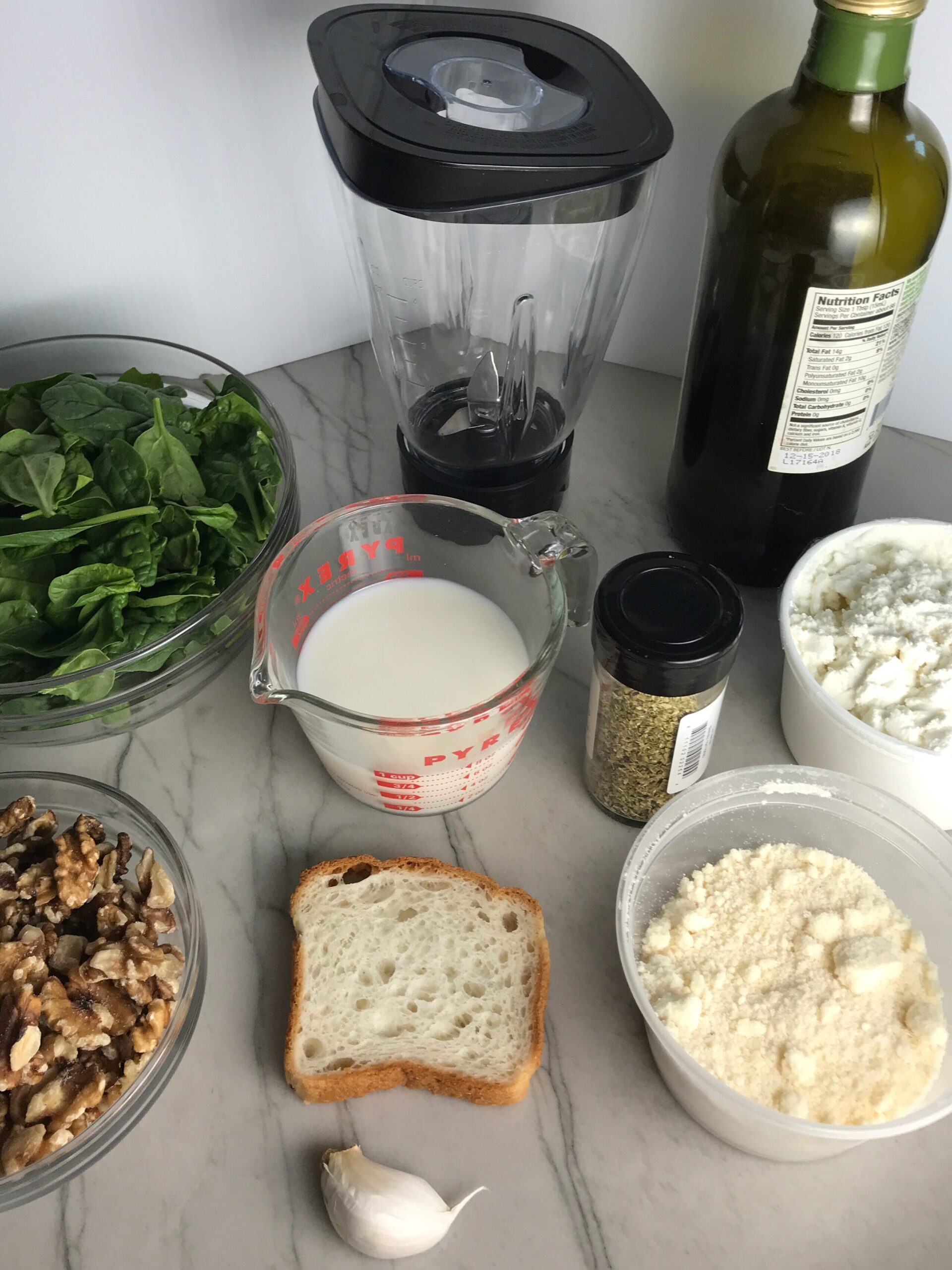 Ingredients for this Walnut Cream Sauce recipe with Ricotta and Spinach. It is thick, rich, nutty, and creamy. It's inspired by the traditional Italian Walnut Sauce from the North-Western Italy, Liguria Region, but my Walnut Sauce recipe adds even more decadence with creamy ricotta and more nutty parmesan cheese.