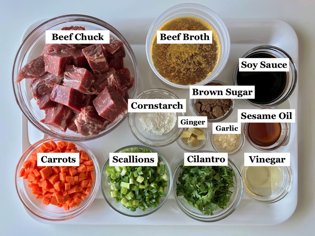 All ingredients chopped and measured in bowls on counter for Korean Beef Stew.