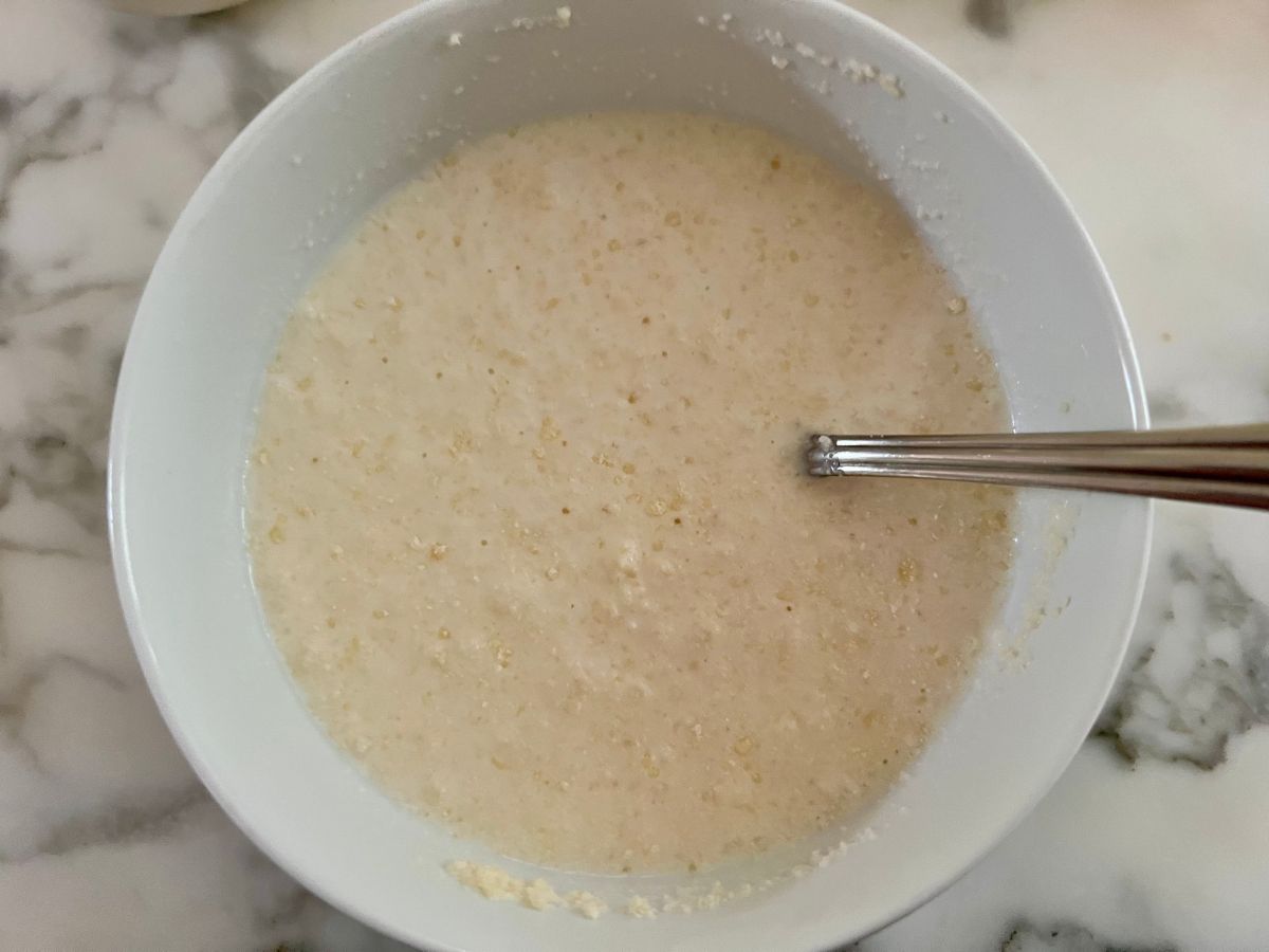 Cornstarch slurry with parmesan cheese mixed in.