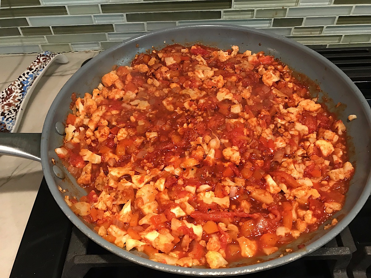 Sauce added to pan cooking cauliflower, red pepper, onions, and minced garlic for the Vegetarian Sloppy Joes recipe.